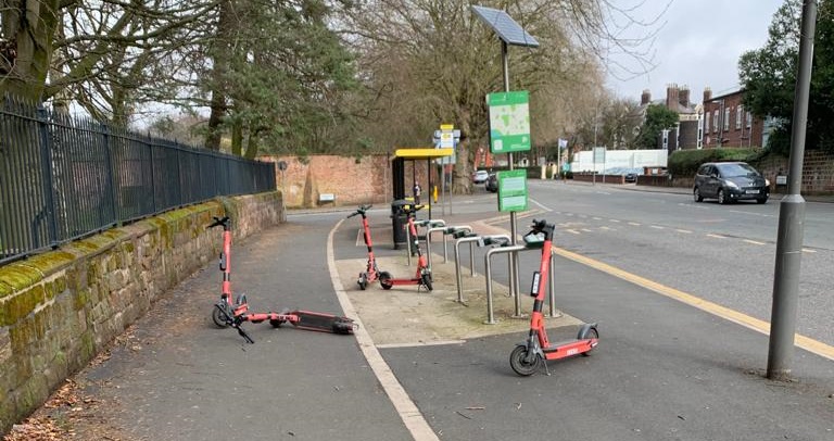 escooters on the pavement